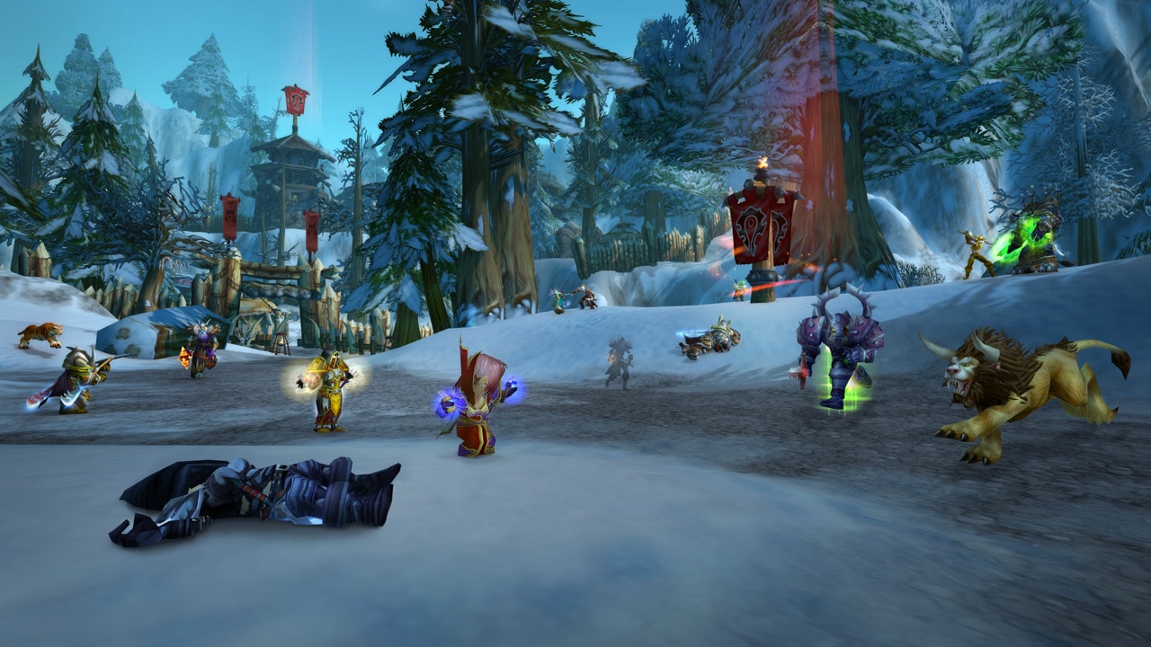 Players battle beside Horde towers in snowy Alterac Valley